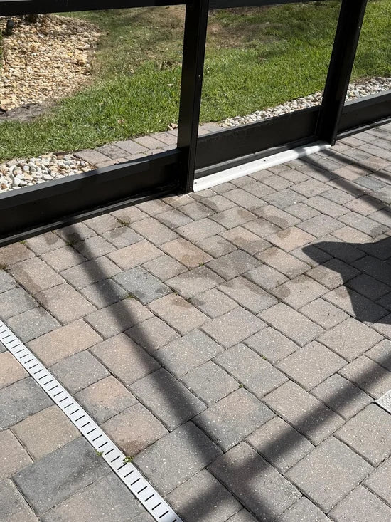 Customer outdoor weed control around a patio and fence